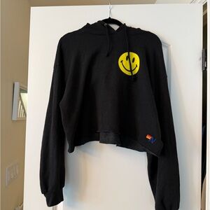 Aviator Nation Black cropped Hooded Sweater with Yellow Smiley Face.
